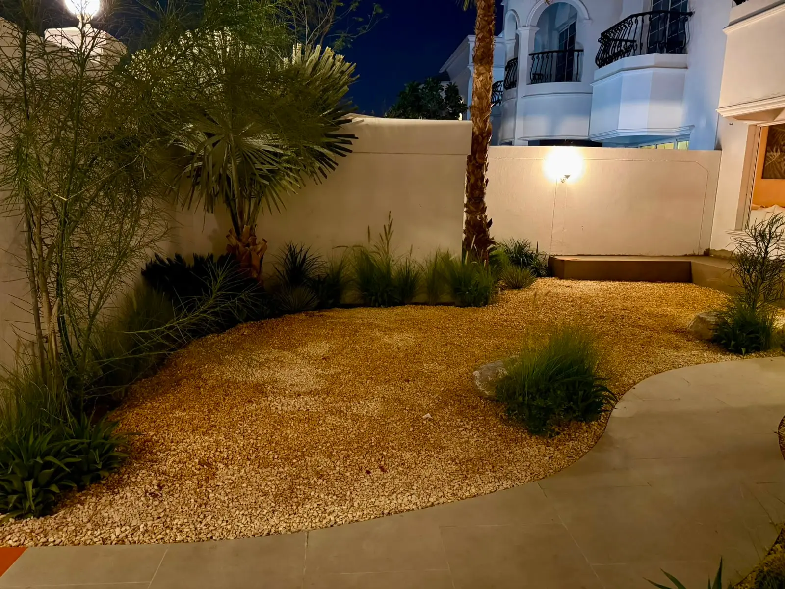 Villa garden lit at evening in Dubai